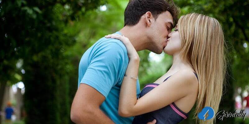 A full-on kiss on the lower lip